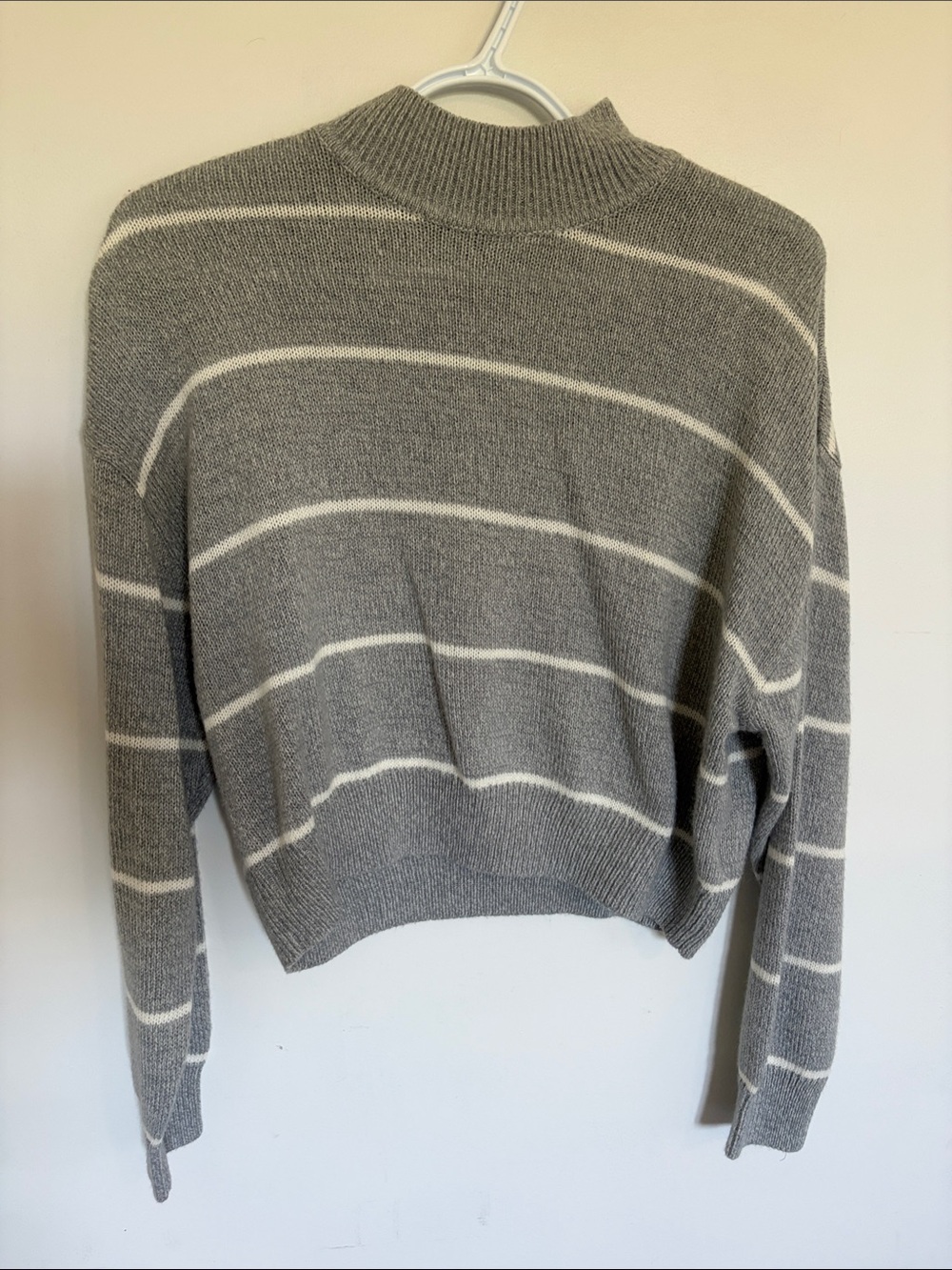 Divided Gray and White Striped Turtleneck Sweater